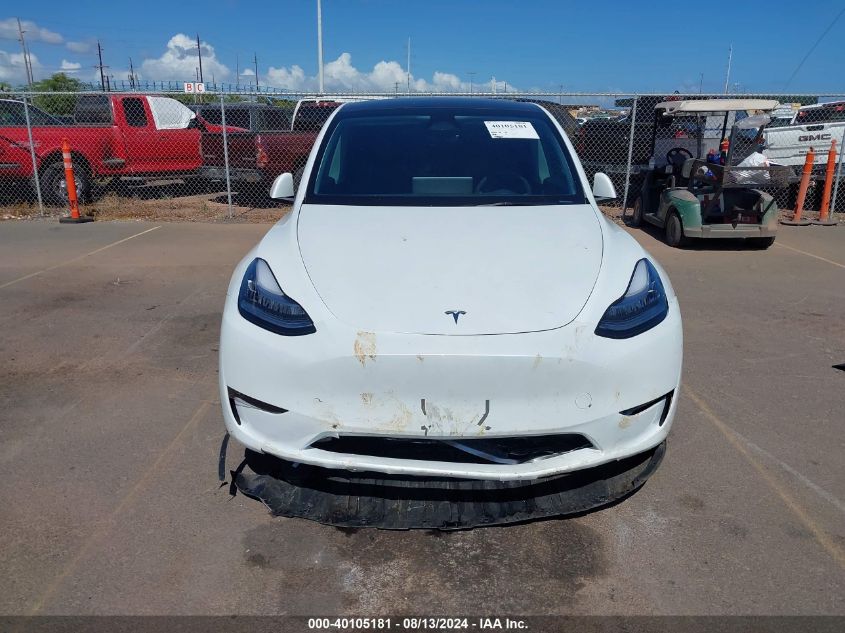 2023 Tesla Model Y VIN: 7SAYGDEE4PA119921 Lot: 40105181