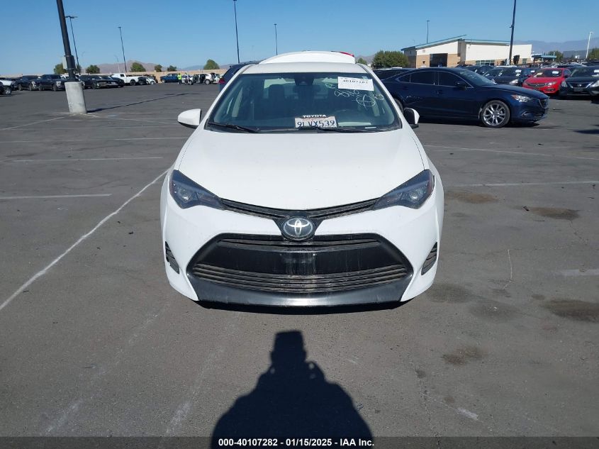 VIN 5YFBURHE3HP657541 2017 Toyota Corolla, L no.13