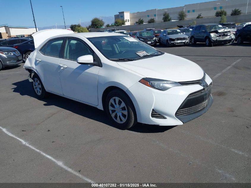 VIN 5YFBURHE3HP657541 2017 Toyota Corolla, L no.1