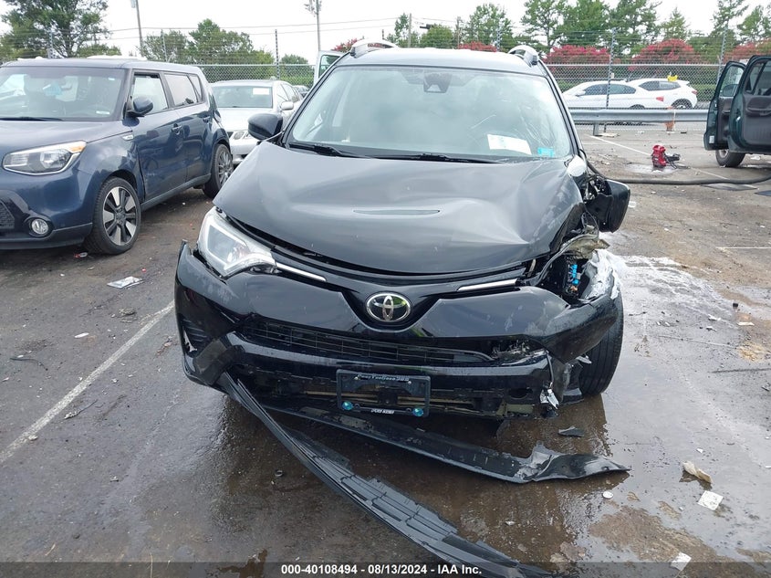 VIN 2T3BFREV1JW857764 2018 TOYOTA RAV4 LE