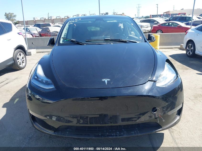 2023 Tesla Model Y Awd/Long Range Dual Motor All-Wheel Drive VIN: 7SAYGDEEXPA034131 Lot: 40111950