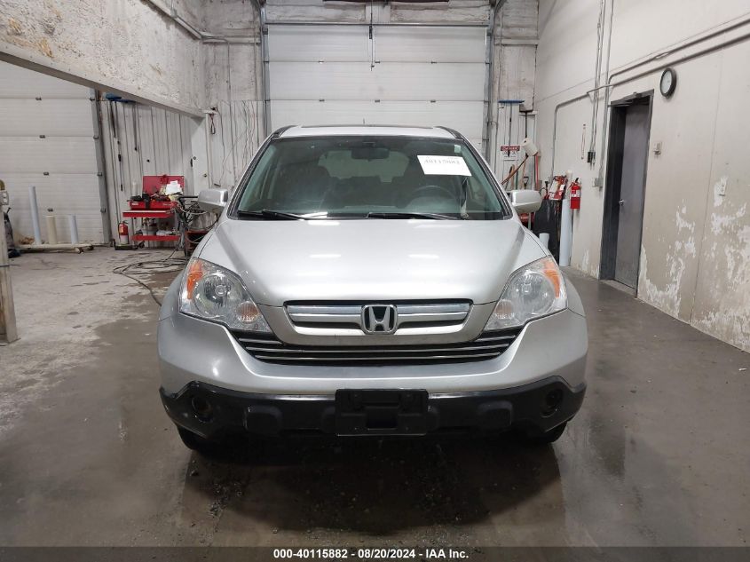 2009 Honda Cr-V Ex-L VIN: JHLRE487X9C011023 Lot: 40115882