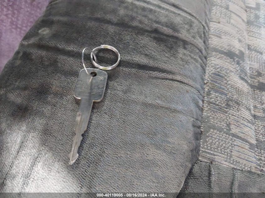 2000 Ford E-150 Recreational VIN: 1FDRE14W7YHA11440 Lot: 40119005