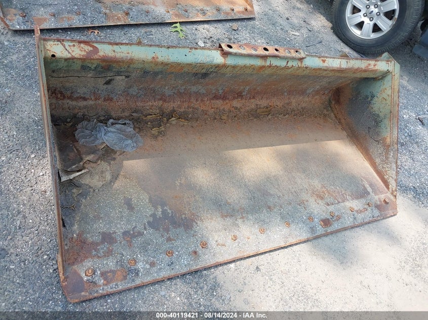 1999 SKID STEER BUCKET 74"