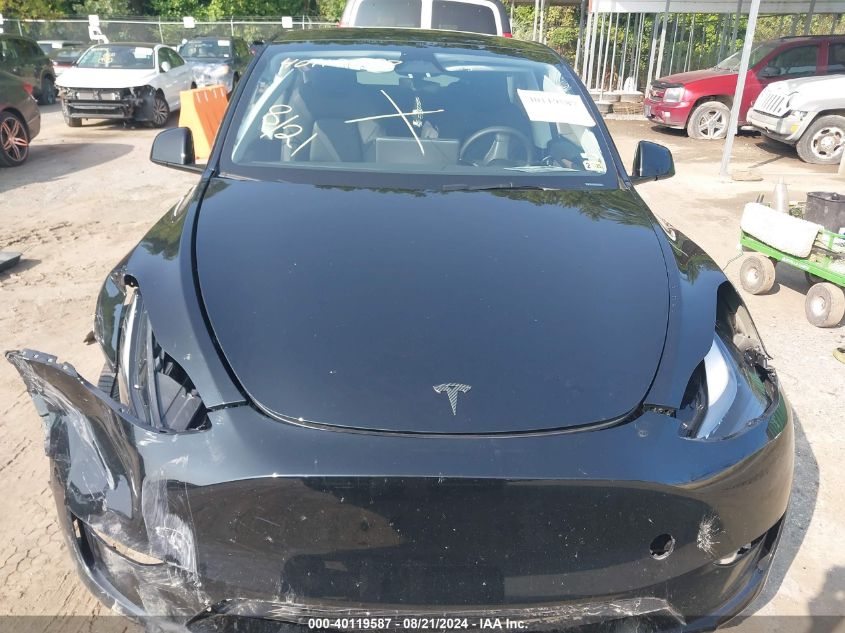 2024 Tesla Model Y VIN: 7SAYGDEE8RA229390 Lot: 40119587