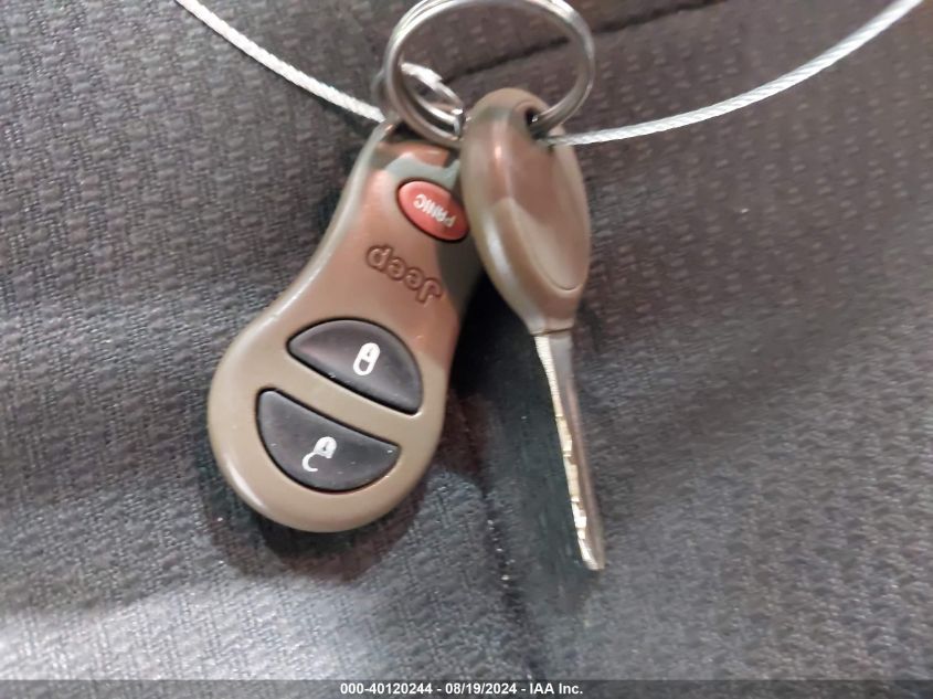 2003 Jeep Grand Cherokee Laredo VIN: 1J8GW48S93C512393 Lot: 40120244