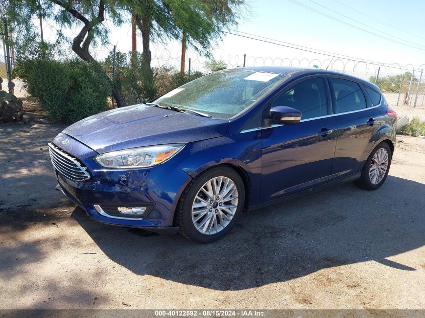 2016 Ford Focus Titanium VIN: 1FADP3N22GL227083 Lot: 40122592