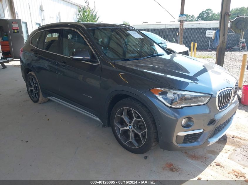 WBXHU7C38H5H37652 2017 BMW X1 - Image 1