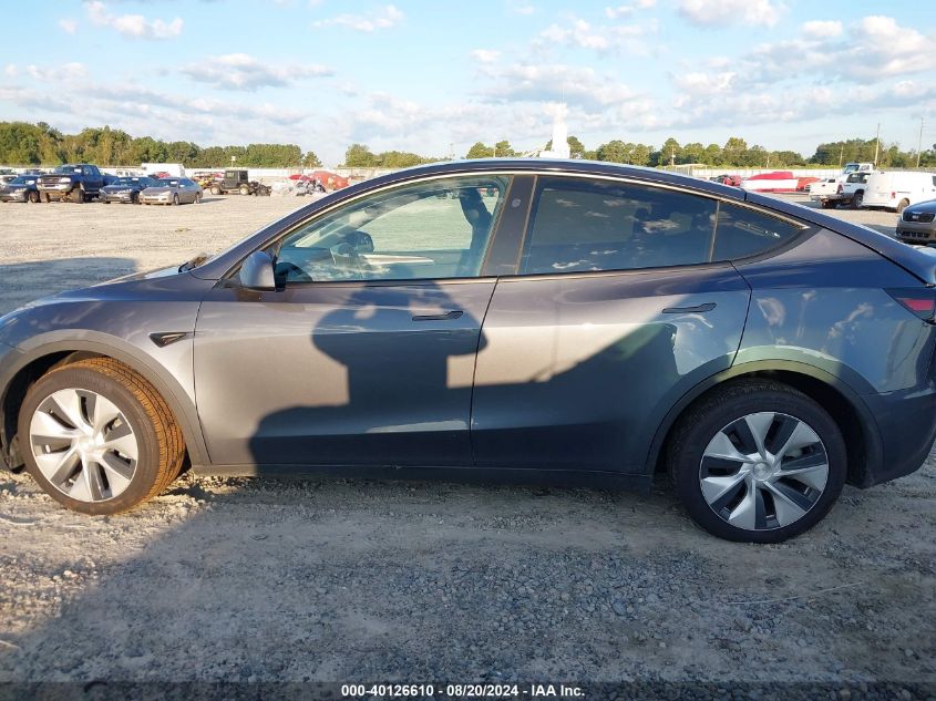 2023 Tesla Model Y Awd/Long Range Dual Motor All-Wheel Drive VIN: 7SAYGAEE4PF878635 Lot: 40126610