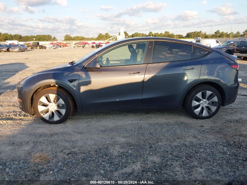 2023 Tesla Model Y Awd/Long Range Dual Motor All-Wheel Drive VIN: 7SAYGAEE4PF878635 Lot: 40126610