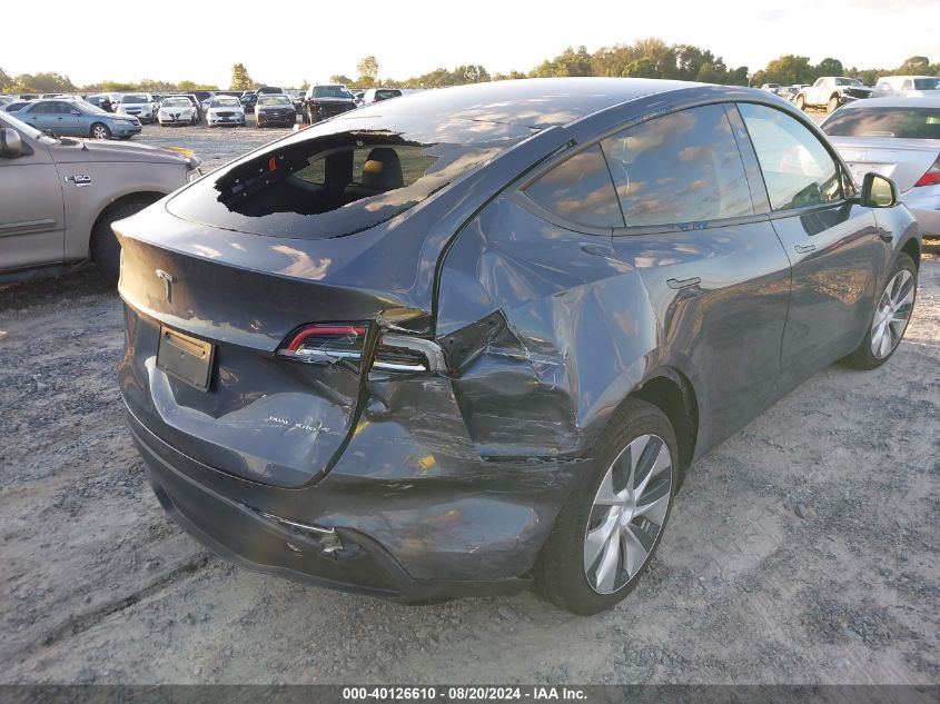 2023 Tesla Model Y Awd/Long Range Dual Motor All-Wheel Drive VIN: 7SAYGAEE4PF878635 Lot: 40126610