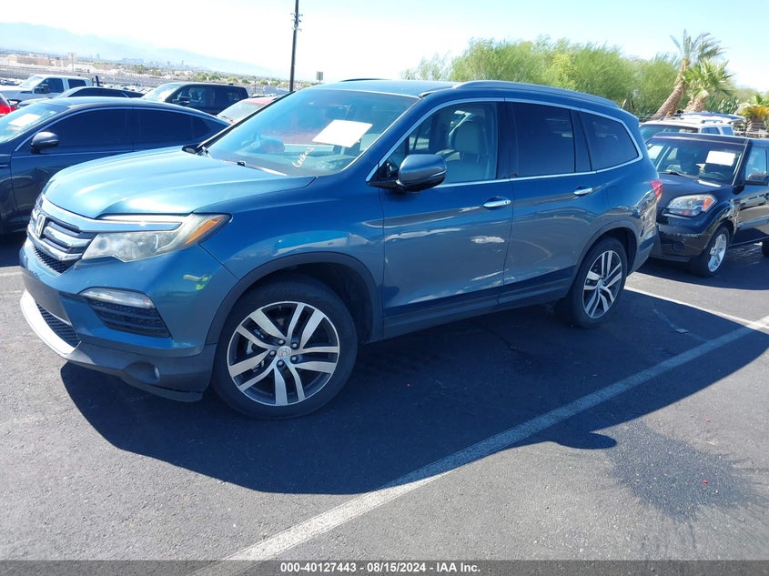 2016 HONDA PILOT TOURING - 5FNYF5H99GB010054