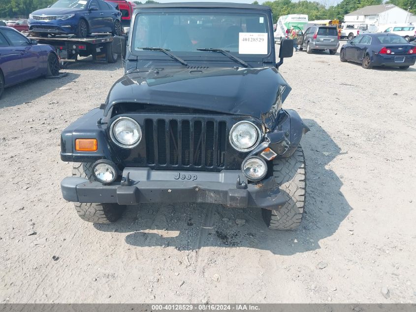 2002 Jeep Wrangler Sahara VIN: 1J4FA59SX2P730706 Lot: 40128529