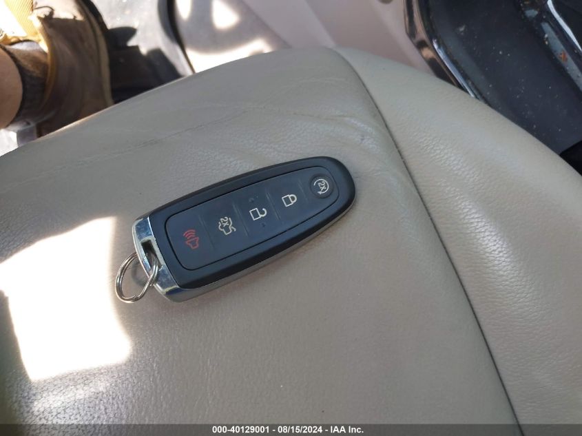 2015 Ford Escape Titanium VIN: 1FMCU9J94FUB69924 Lot: 40129001