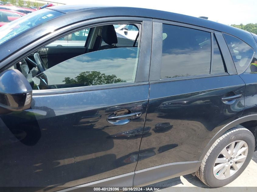 2014 Mazda Cx-5 Touring VIN: JM3KE2CY2E0421904 Lot: 40129396