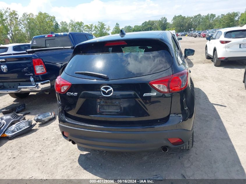 2014 Mazda Cx-5 Touring VIN: JM3KE2CY2E0421904 Lot: 40129396