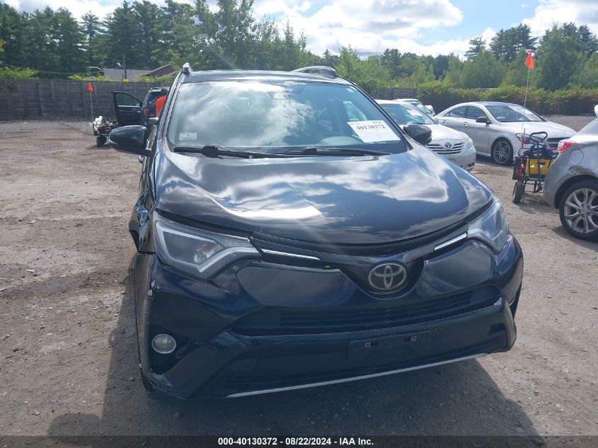 2018 Toyota Rav4 Xle VIN: 2T3RFREV0JW704792 Lot: 40130372