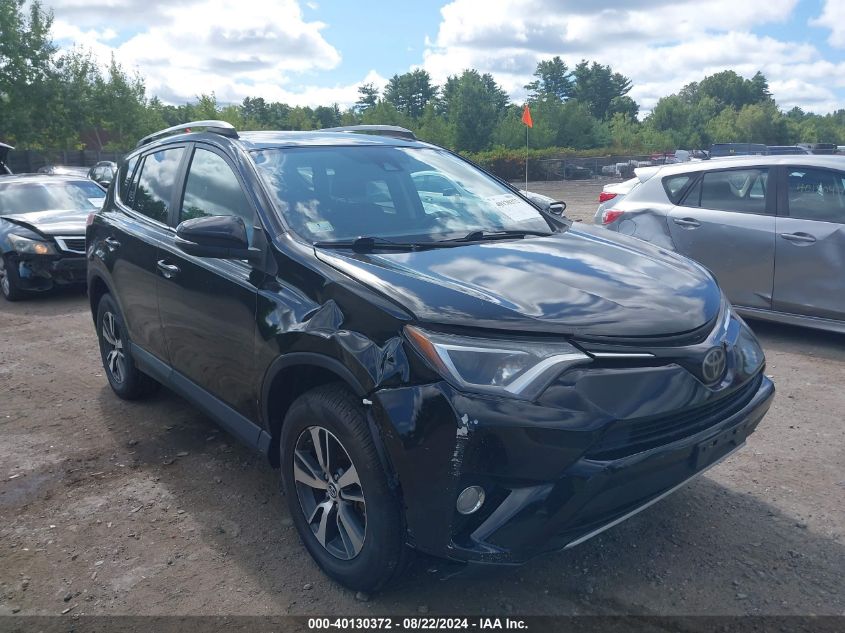 2018 Toyota Rav4 Xle VIN: 2T3RFREV0JW704792 Lot: 40130372