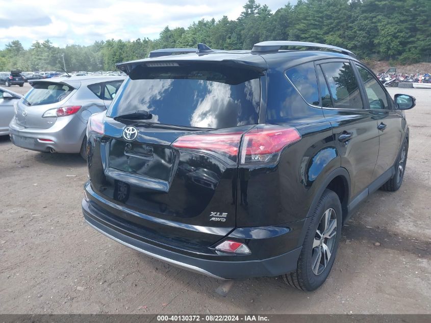 2018 Toyota Rav4 Xle VIN: 2T3RFREV0JW704792 Lot: 40130372