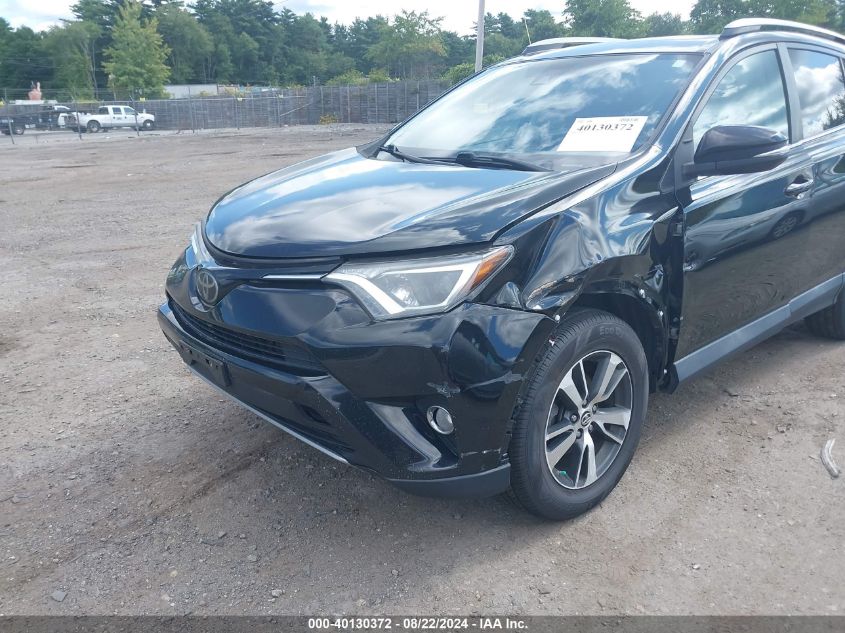 2018 Toyota Rav4 Xle VIN: 2T3RFREV0JW704792 Lot: 40130372