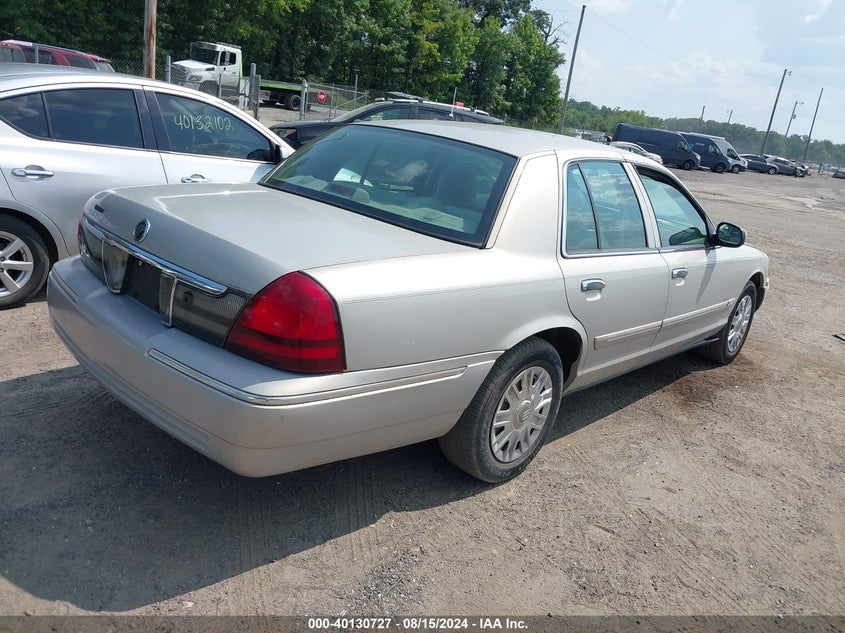 2007 Mercury Grand Marquis Gs VIN: 2MEFM74V47X631499 Lot: 40130727