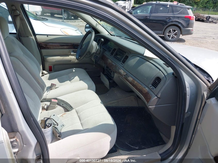 2007 Mercury Grand Marquis Gs VIN: 2MEFM74V47X631499 Lot: 40130727