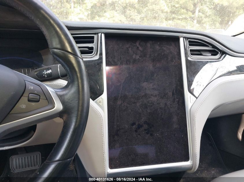 2015 Tesla Model S VIN: 5YJSA1E14FF102148 Lot: 40131626