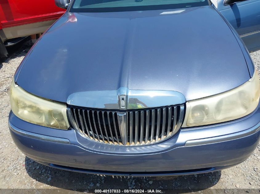 2000 Lincoln Town Car Executive VIN: 1LNHM81W4YY937287 Lot: 40137833