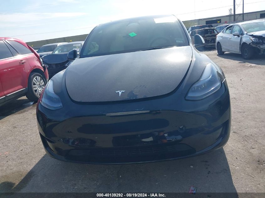 2023 Tesla Model Y Awd/Long Range Dual Motor All-Wheel Drive VIN: 7SAYGDEE8PA210478 Lot: 40139292