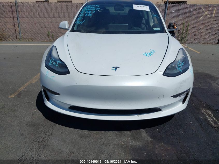 2018 Tesla Model 3 Long Range/Performance VIN: 5YJ3E1EB6JF067719 Lot: 40140013
