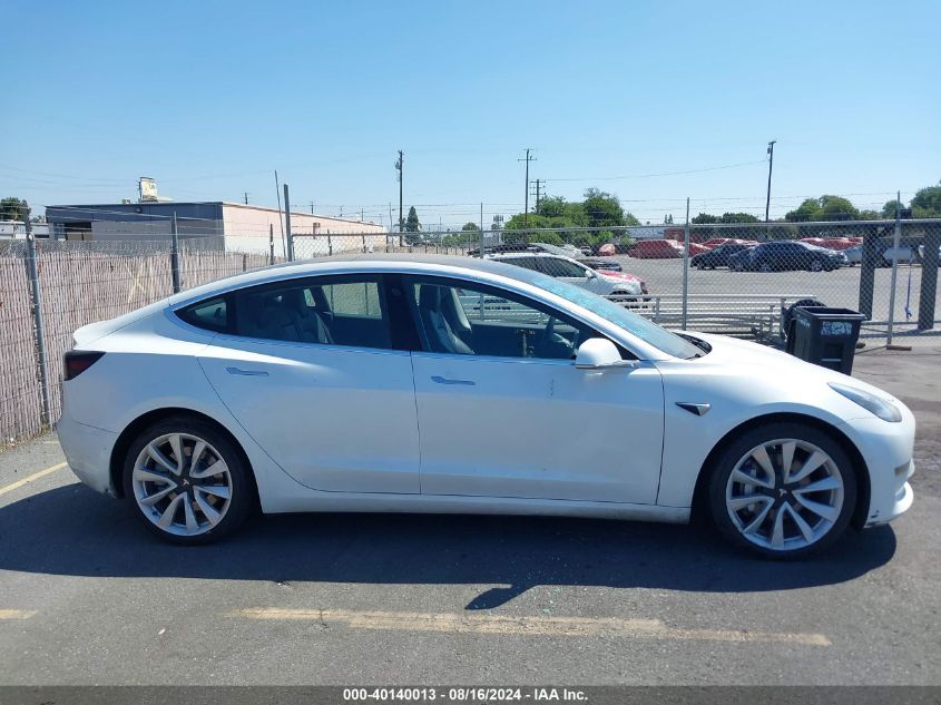 2018 Tesla Model 3 Long Range/Performance VIN: 5YJ3E1EB6JF067719 Lot: 40140013
