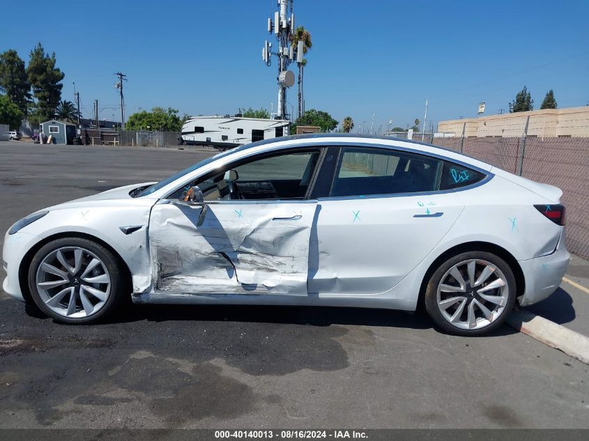 2018 Tesla Model 3 Long Range/Performance VIN: 5YJ3E1EB6JF067719 Lot: 40140013