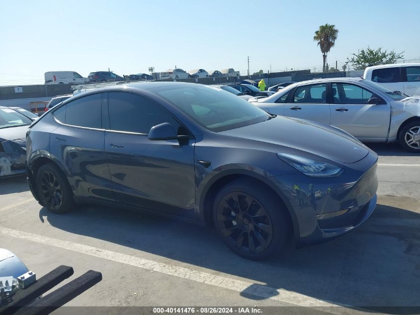 2023 Tesla Model Y Awd/Long Range Dual Motor All-Wheel Drive VIN: 7SAYGDEE4PA031287 Lot: 40141476