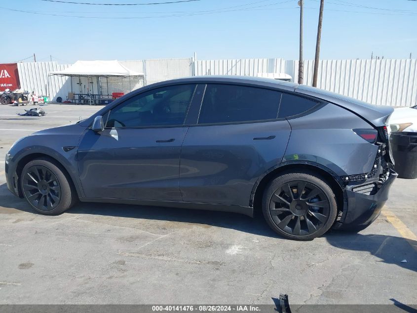 2023 Tesla Model Y Awd/Long Range Dual Motor All-Wheel Drive VIN: 7SAYGDEE4PA031287 Lot: 40141476