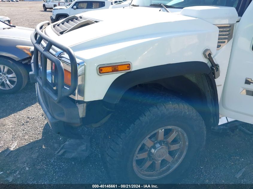 2003 Hummer H2 VIN: 5GRGN23UX3H122847 Lot: 40145661