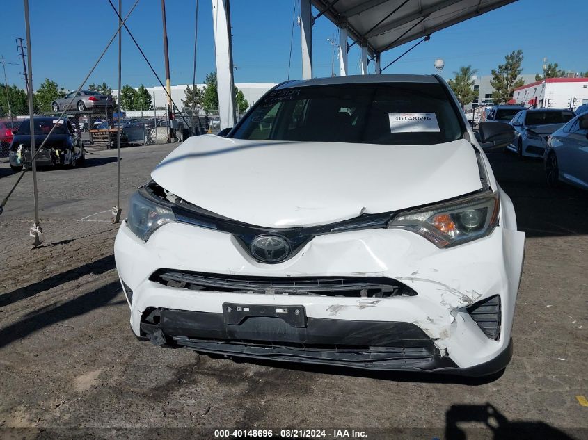 2018 Toyota Rav4 Le VIN: JTMZFREV1JJ737864 Lot: 40148696