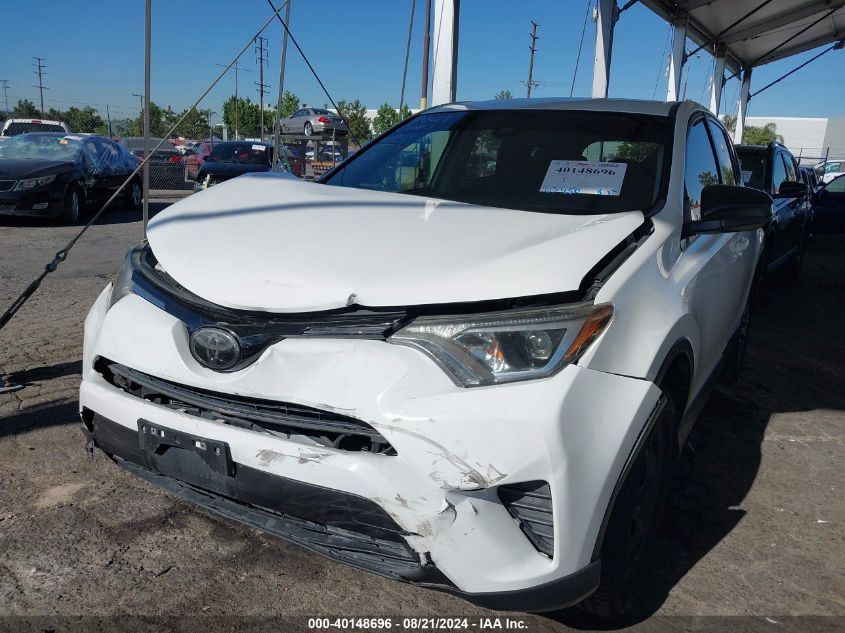 2018 Toyota Rav4 Le VIN: JTMZFREV1JJ737864 Lot: 40148696