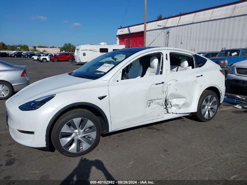 2024 Tesla Model Y Long Range Dual Motor All-Wheel Drive VIN: 7SAYGDEE3RF982019 Lot: 40152992