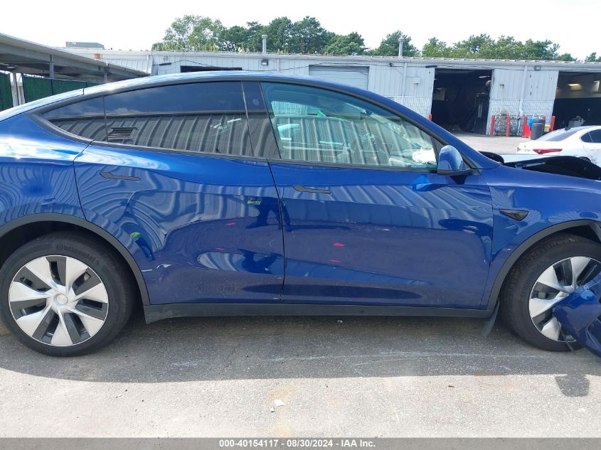 2023 Tesla Model Y Awd/Long Range Dual Motor All-Wheel Drive VIN: 7SAYGDEE1PF801674 Lot: 40154117