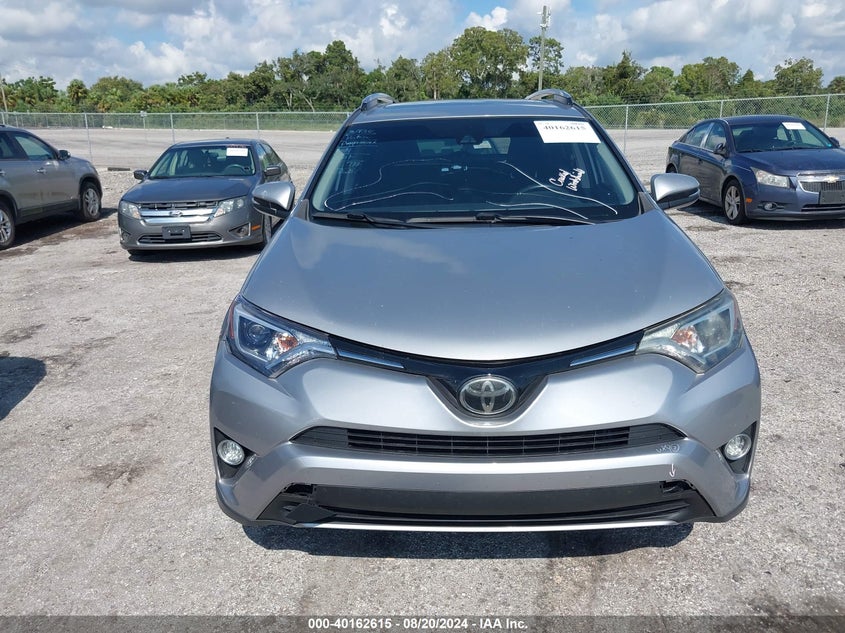 2018 TOYOTA RAV4 XLE - JTMWFREV9JD122576