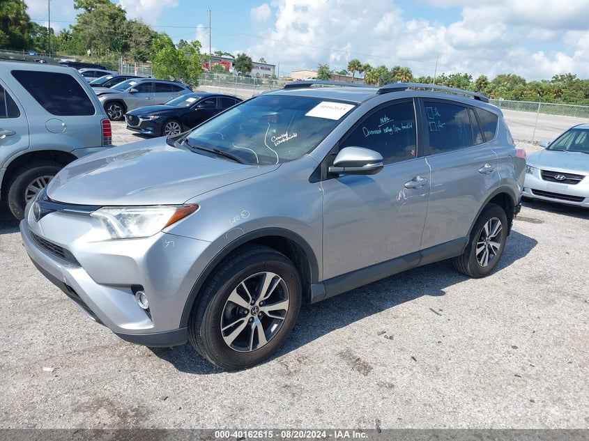 2018 TOYOTA RAV4 XLE - JTMWFREV9JD122576