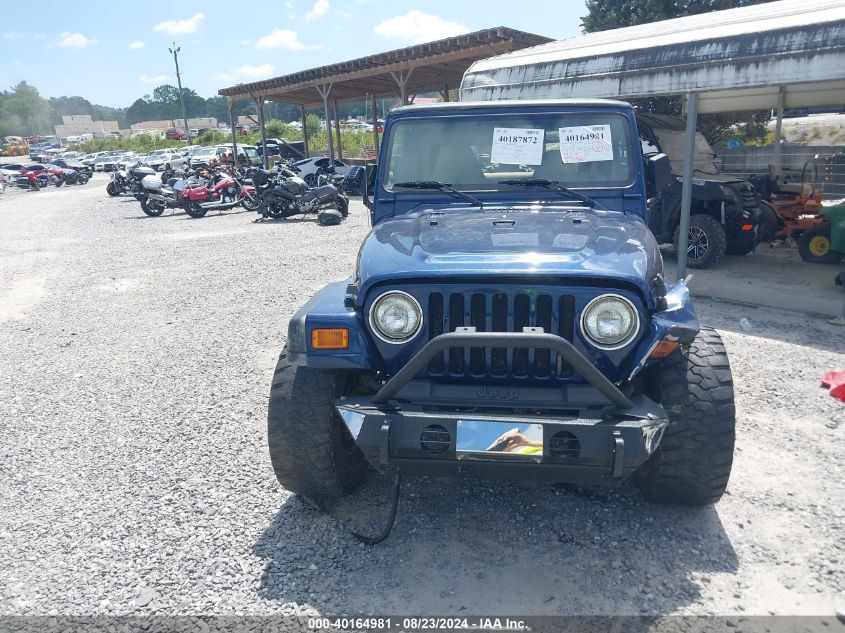 2002 Jeep Wrangler Sport VIN: 1J4FA49S82P716510 Lot: 40164981