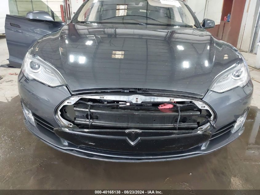 2014 Tesla Model S P85 VIN: 5YJSA1H10EFP63945 Lot: 40165138