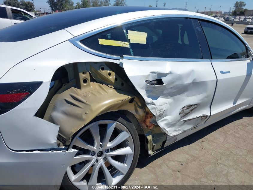 2020 Tesla Model 3 Standard Range Plus Rear-Wheel Drive/Standard Range Rear-Wheel Drive VIN: 5YJ3E1EA2LF661623 Lot: 40165231