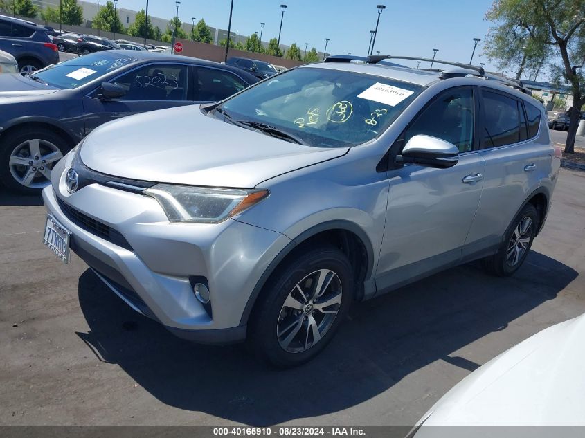 2T3WFREV6GW287660 2016 TOYOTA RAV 4 - Image 2