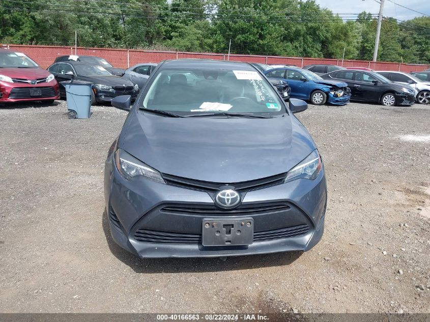 2018 Toyota Corolla Le VIN: 5YFBURHE0JP819194 Lot: 40166563