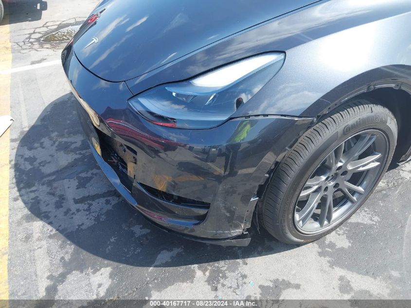 2024 Tesla Model Y VIN: 7SAYGDEE0RF125799 Lot: 40167717