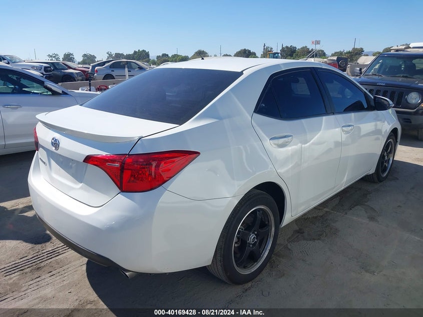 VIN 5YFBURHEXHP692173 2017 TOYOTA COROLLA SE