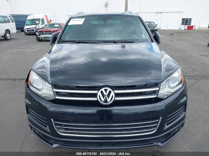 2014 Volkswagen Touareg Tdi R-Line VIN: WVGDP9BP9ED001400 Lot: 40170162