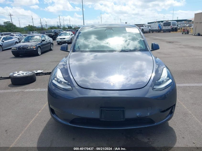 2023 Tesla Model Y VIN: 7SAYGAEE8PF583828 Lot: 40170437